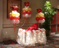 focal table with balloon clouds