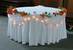 Focal Table with Flower Garland and Lights