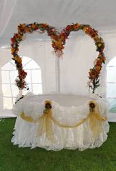 Cake table with wrought iron arch