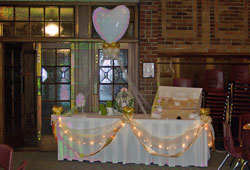 Entrance table with Ribbon Draping and Lights