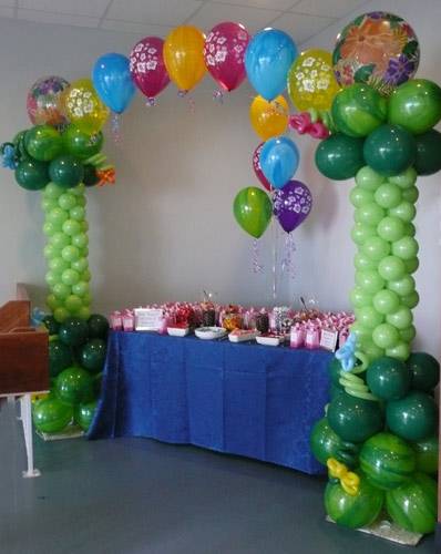 Balloon arch over child's birthday table
