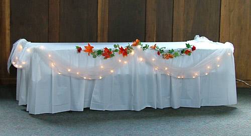 Gift table with lights and garland