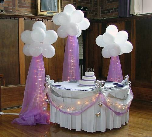 Cake table with Fantasy Cloud backdrop