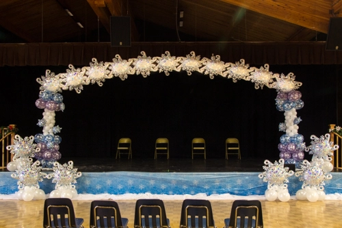 snowflake arch over stage