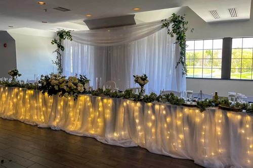 head table with organza backdrop