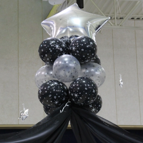Black and silver foil and latex balloon decor