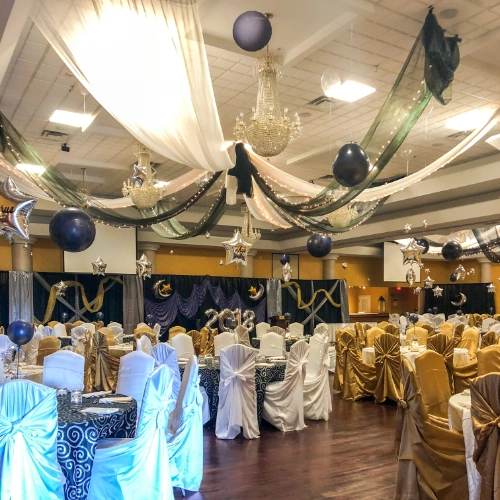 black and white ceiling treatment with black balloon balls
