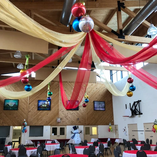 organza ceiling treatment for Christmas with large tree balls