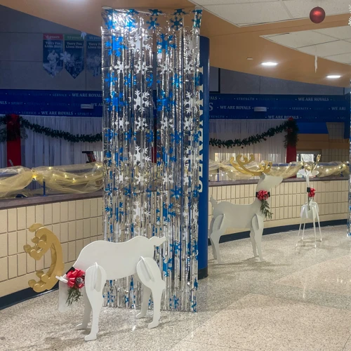 school winter dance decor with wooden reindeer