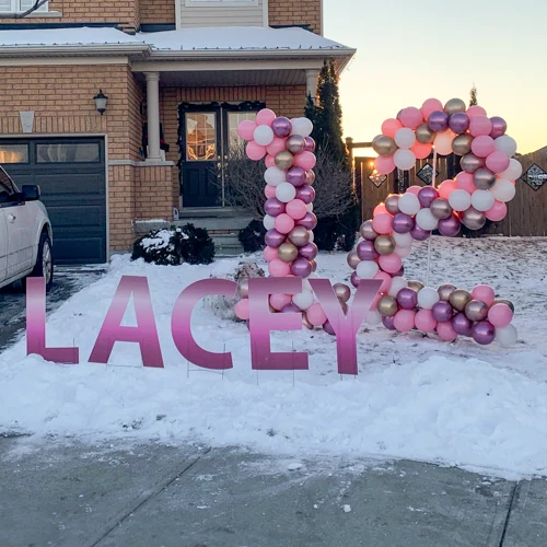 balloon sculpture of age, and name in letters