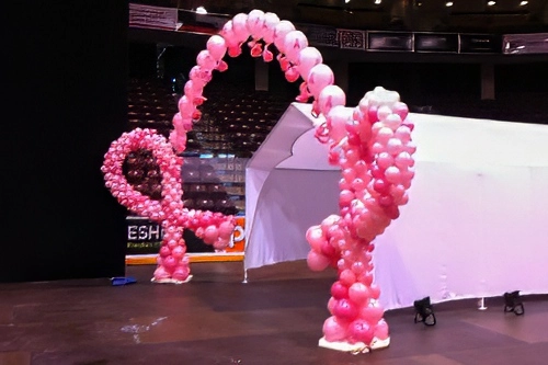 breast cancer logo in pink balloons