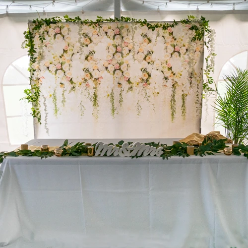 table backdrop with greenery