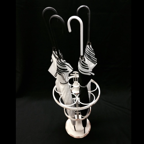 decor items—vintage rustic umbrella stand with umbrellas