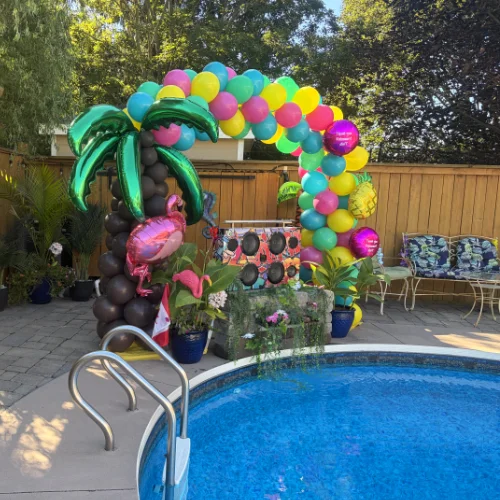 pool decor with multicoloured balloon palm tree