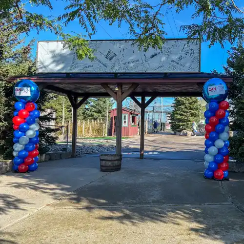 red and blue balloon columns for entrance to company event