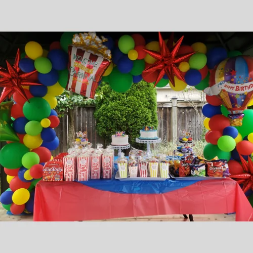 colourful balloon arch in a carnival theme for a child's birthday