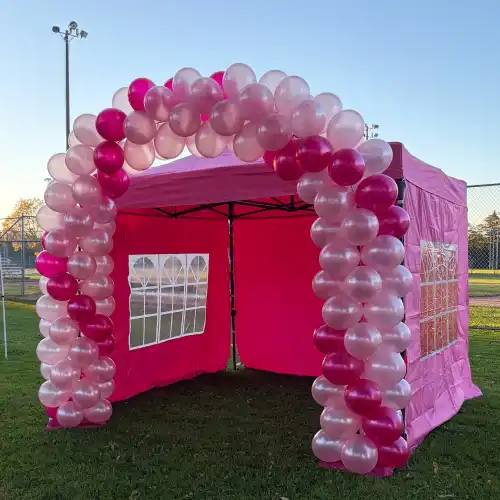 pink balloon arch and tent for Durham Run for the Cure, breast cancer